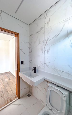 Casa à venda com 160m², 3 quartos e 5 vagasBanheiro da Suíte 1