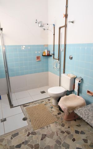 Casa à venda com 260m², 4 quartos e 4 vagasBanheiro