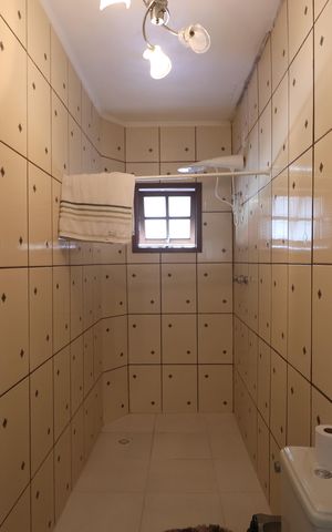 Casa à venda com 246m², 3 quartos e 2 vagasBanheiro da Suíte 1