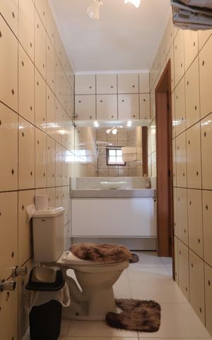 Casa à venda com 246m², 3 quartos e 2 vagasBanheiro da Suíte 1