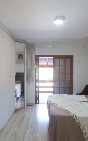 Casa à venda com 246m², 3 quartos e 2 vagasSuíte 1