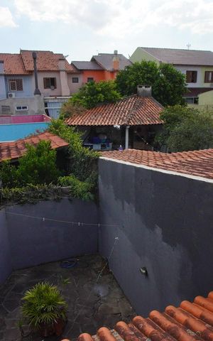 Casa à venda com 120m², 3 quartos e 2 vagasQuarto 2 - Vista