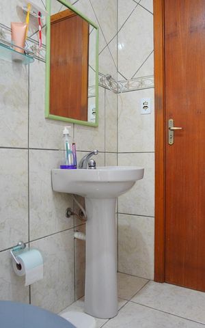 Casa à venda com 120m², 3 quartos e 2 vagasBanheiro Corredor