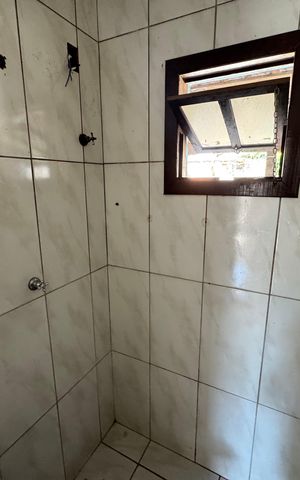 Casa à venda com 40m², 2 quartos e 1 vaga Casa à venda com 40m², 2 quartos e 1 vagaBanheiro