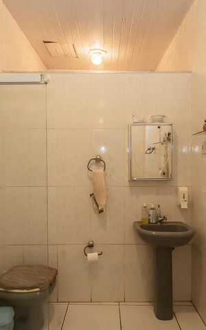 Casa à venda com 220m², 4 quartos e 2 vagasBanheiro