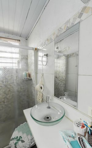 Casa à venda com 220m², 4 quartos e 2 vagasCasa 2 Banheiro