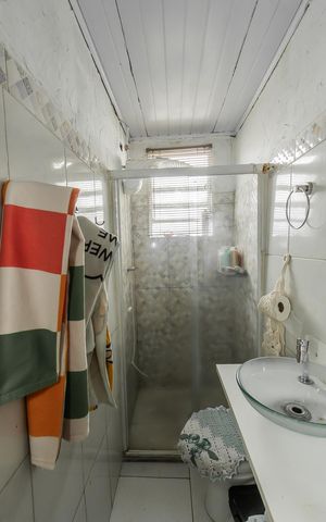 Casa à venda com 220m², 4 quartos e 2 vagasCasa 2 Banheiro