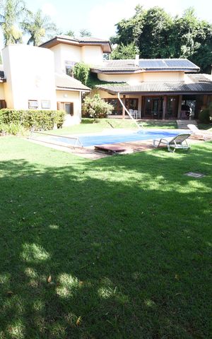 Casa de condomínio à venda com 420m², 4 quartos e 7 vagasQuintal / Jardim
