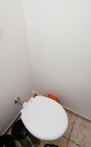 Casa de condomínio à venda com 420m², 4 quartos e 7 vagasBanheiro de serviço
