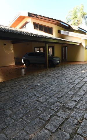 Casa de condomínio à venda com 420m², 4 quartos e 7 vagasGaragem