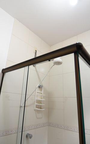 Casa de condomínio à venda com 420m², 4 quartos e 7 vagasBanheiro da Churrasqueira