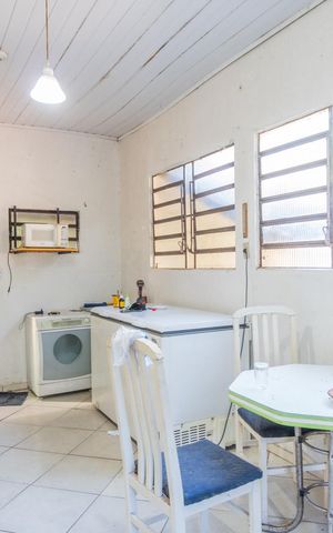 Casa à venda com 80m², 3 quartos e 3 vagas Casa à venda com 80m², 3 quartos e 3 vagasCozinha
