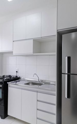 Apartamento à venda com 52m², 2 quartos e 1 vaga Apartamento à venda com 52m², 2 quartos e 1 vagaCozinha e Área de Serviço