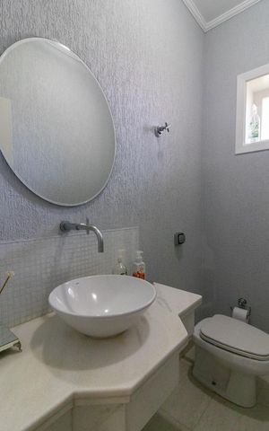 Casa de condomínio à venda com 390m², 4 quartos e 4 vagas Casa de condomínio à venda com 390m², 4 quartos e 4 vagasLavabo