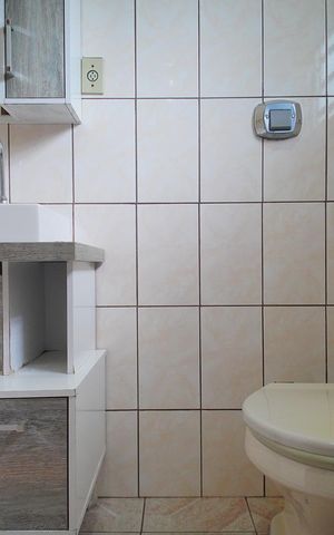 Casa à venda com 100m², 3 quartos e 1 vaga Casa à venda com 100m², 3 quartos e 1 vagaBanheiro 1