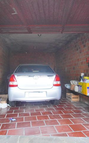 Casa à venda com 100m², 3 quartos e 1 vaga Casa à venda com 100m², 3 quartos e 1 vagaGaragem
