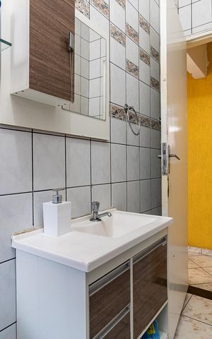 Casa à venda com 150m², 5 quartos e 2 vagas Casa à venda com 150m², 5 quartos e 2 vagasBanheiro 2