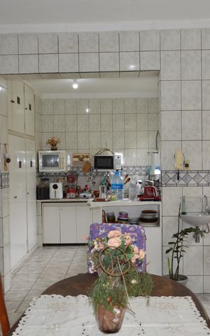 Casa à venda com 258m², 6 quartos e 5 vagasCozinha