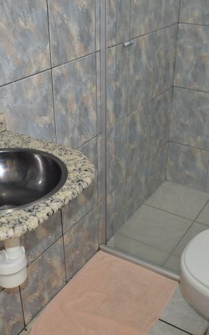 Casa à venda com 258m², 6 quartos e 5 vagasBanheiro da Suíte 2
