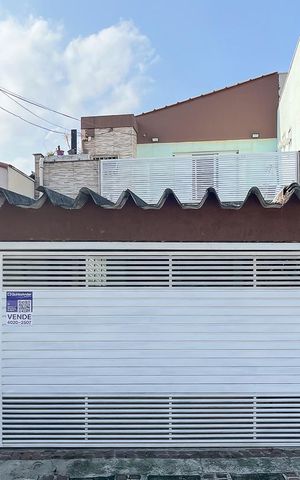 Casa à venda com 162m², 3 quartos e 3 vagasFachada + plaquinha