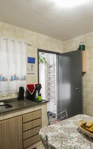 Casa à venda com 134m², 3 quartos e 2 vagas Casa à venda com 134m², 3 quartos e 2 vagasCozinha