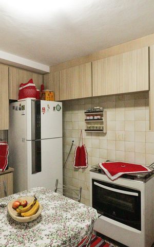 Casa à venda com 134m², 3 quartos e 2 vagas Casa à venda com 134m², 3 quartos e 2 vagasCozinha