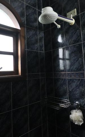 Casa de condomínio à venda com 380m², 6 quartos e 6 vagasBanheiro da Suíte 2