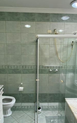 Casa à venda com 317m², 4 quartos e 3 vagasCasa 1 - Banheiro da Suíte 1