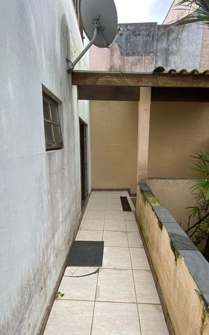 Casa à venda com 317m², 4 quartos e 3 vagasCasa 1 - Corredor externo