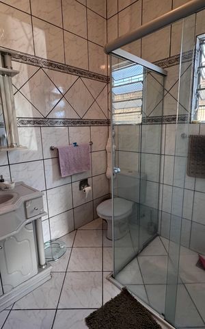 Casa à venda com 158m², 3 quartos e 1 vaga Casa à venda com 158m², 3 quartos e 1 vagaBanheiro da Suíte