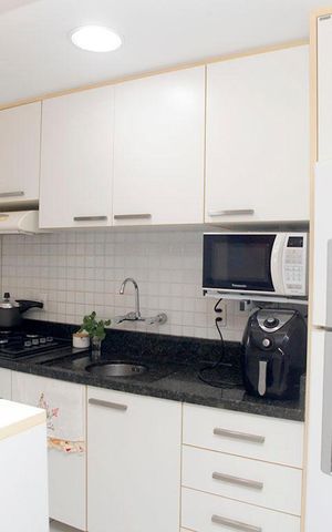 Apartamento à venda com 62m², 2 quartos e 1 vagaCozinha + Área de Serviço
