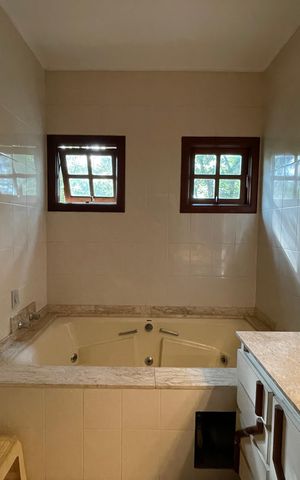 Casa à venda com 410m², 3 quartos e 8 vagasBanheiro 3