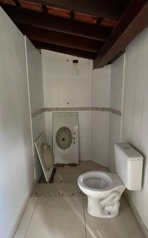 Casa à venda com 410m², 3 quartos e 8 vagasBanheiro 4