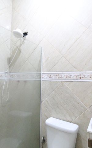 Casa à venda com 200m², 1 quarto e 4 vagasBanheiro da suíte