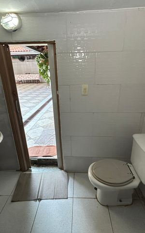 Casa à venda com 480m², 4 quartos e 4 vagasBanheiro 2