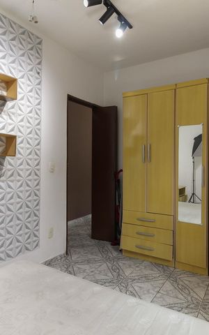 Casa à venda com 70m², 2 quartos e 2 vagas Casa à venda com 70m², 2 quartos e 2 vagasQuarto 1