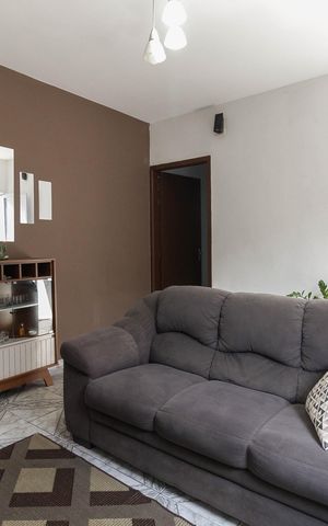 Casa à venda com 70m², 2 quartos e 2 vagas Casa à venda com 70m², 2 quartos e 2 vagasSala