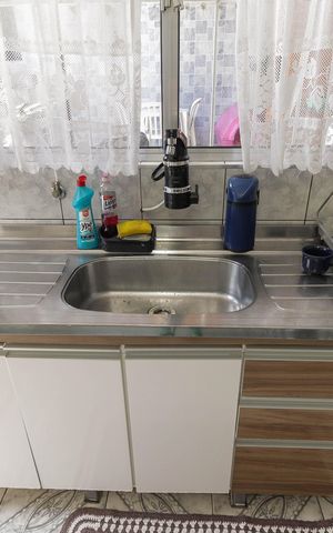 Casa à venda com 70m², 2 quartos e 2 vagas Casa à venda com 70m², 2 quartos e 2 vagasCozinha