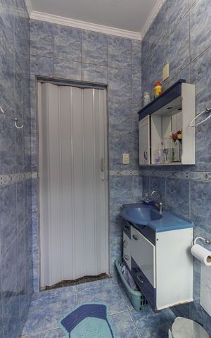 Casa à venda com 70m², 2 quartos e 2 vagas Casa à venda com 70m², 2 quartos e 2 vagasBanheiro da Suíte