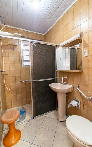 Casa à venda com 100m², 3 quartos e 4 vagasBanheiro