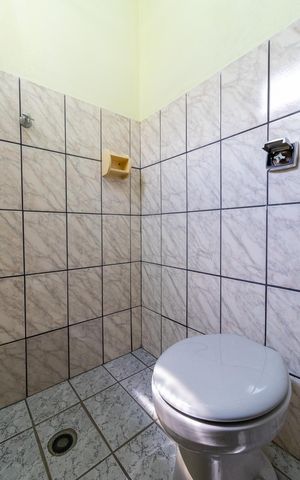 Casa à venda com 100m², 3 quartos e 4 vagasBanheiro do Salão
