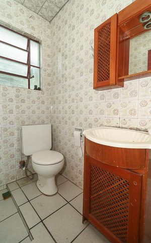Casa à venda com 270m², 7 quartos e 2 vagasBanheiro 4