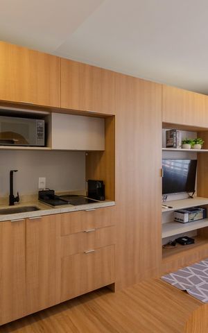 Studio à venda com 27m², 1 quarto e 1 vaga Studio à venda com 27m², 1 quarto e 1 vagaSala/Cozinha
