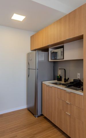 Studio à venda com 27m², 1 quarto e 1 vaga Studio à venda com 27m², 1 quarto e 1 vagaSala/Cozinha