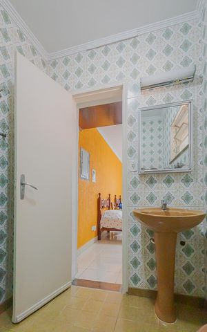 Casa à venda com 350m², 3 quartos e 8 vagasBanheiro da Suíte 1