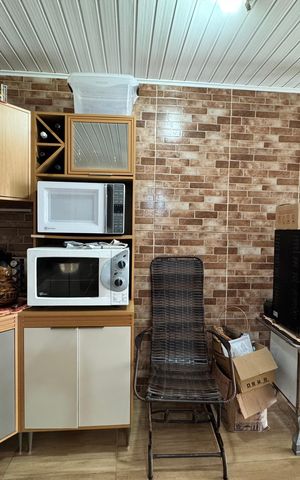 Casa à venda com 60m², 2 quartos e 1 vaga Casa à venda com 60m², 2 quartos e 1 vagaCozinha