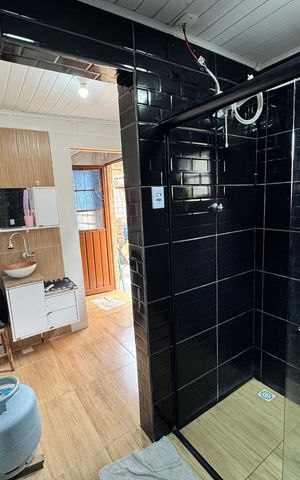 Casa à venda com 60m², 2 quartos e 1 vaga Casa à venda com 60m², 2 quartos e 1 vagaBanheiro