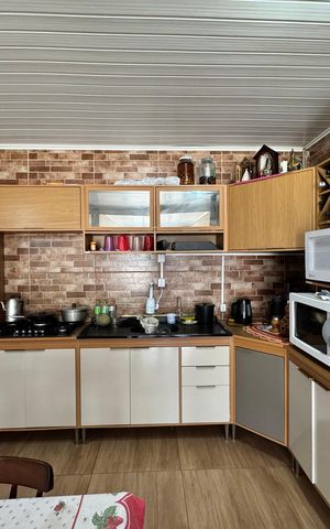 Casa à venda com 60m², 2 quartos e 1 vaga Casa à venda com 60m², 2 quartos e 1 vagaCozinha