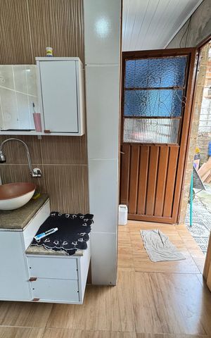 Casa à venda com 60m², 2 quartos e 1 vaga Casa à venda com 60m², 2 quartos e 1 vagaBanheiro
