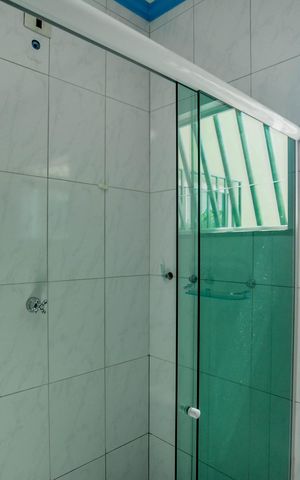 Casa à venda com 300m², 4 quartos e 4 vagas Casa à venda com 300m², 4 quartos e 4 vagasBanheiro da Suíte 2
